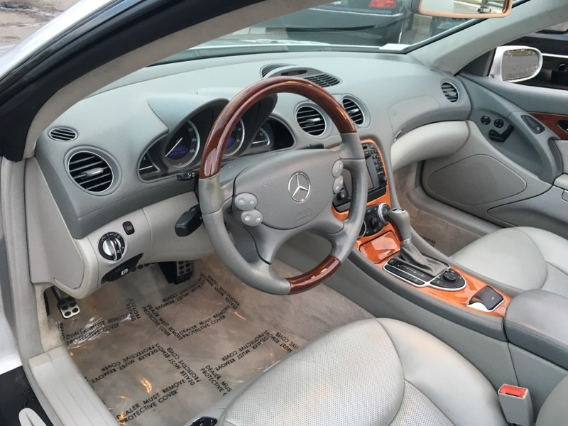 Illustration for article titled Why The Hell Would You Buy A Mazda Miata When This V12 Mercedes Is Way Cheaper?Â